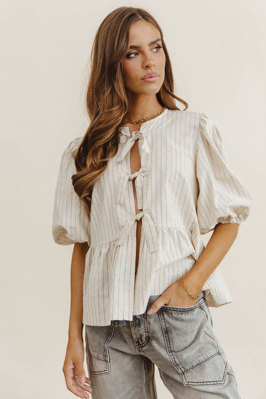 Corey Peplum Top in Tan