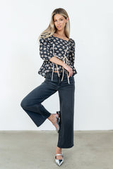 Jerzey Floral Peplum Blouse in Black